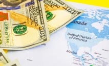 الدولار‭ ‬يتحدى‭ ‬الأزمات‭ ‬ويحمي‭ ‬عرشه‭ ‬العالمي